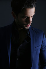 Fototapeta premium Elegant handsome man. Studio fashion portrait.
