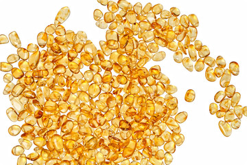 Yellow amber stones on a white background.