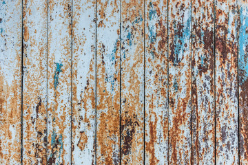 Fototapeta na wymiar planked wooden background with scratched paint