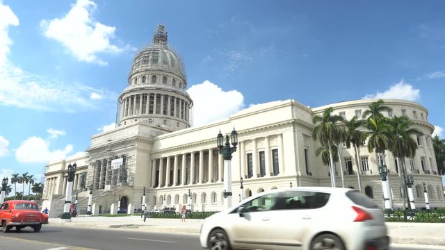 Panoramic view on road near the building Capitol in Havana at summer sunny day