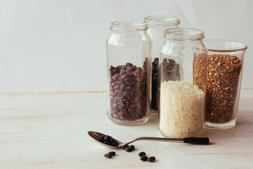 Beans, rice and buckweath in glasses
