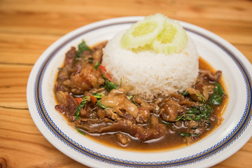 stir-fried pork and basil and fried egg