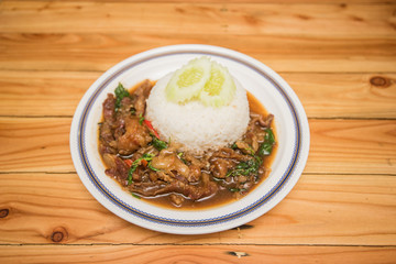 stir-fried pork and basil and fried egg