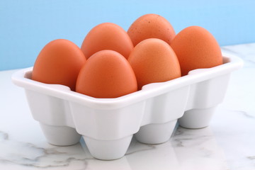 Fresh eggs on kitchen station