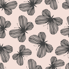 Seamless pattern with exotic butterflies.