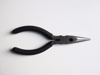 Pliers on white background