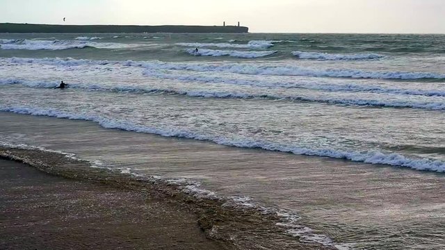 Windsurfer on beach, Tramor beach, County of Waterford, Republic of Ireland