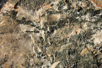Patterns of stone sea with minerals. Texture background.