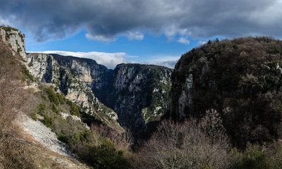 The impressive Vikos gorge in the Zagoria region, Western Greece, the deepest in Europe, with some ruins of a monk house.
