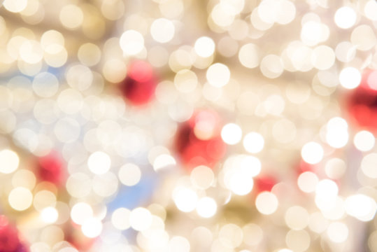 Bokeh blur of decoration red  bauble decorated on white Christma