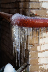 Icicles hanging on the gutter