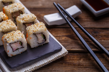 Fototapeta na wymiar Delicious fresh rolls closeup