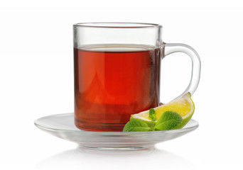 Tea cup with fresh mint and lime isolated