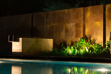 Night scenery near the poolside with new granite tile brick work