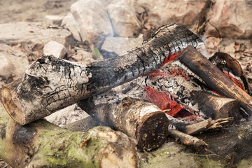 An outdoor open fireplace