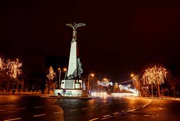The Aviators Statue from Bucharest, Romania, Christmas lights night time