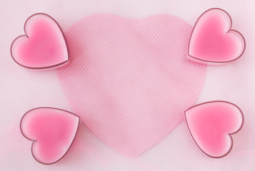 Card with four pink hearts, paper and greed