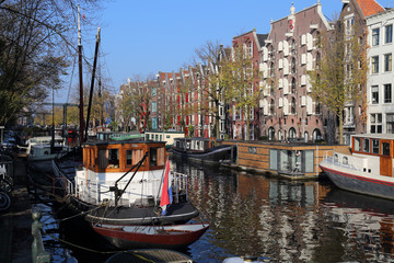 Fototapeta na wymiar Canal in autumn in Amsterdam, Holland