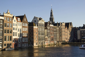 Historical buildings and church tower in Amsterdam