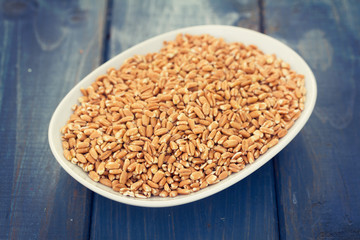 spelt on white dish