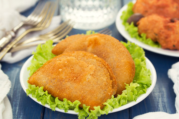 typical portuguese snack ricoes de carne