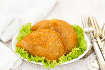 typical portuguese snack ricoes de carne