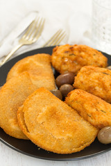 typical portuguese snack ricoes de carne