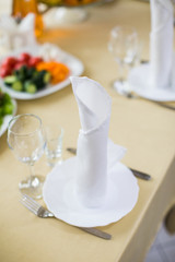 Banquet wedding table setting on evening reception