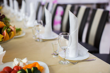 Banquet wedding table setting on evening reception