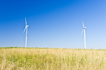 Modern windmills at flat land of Banat region, west Romania