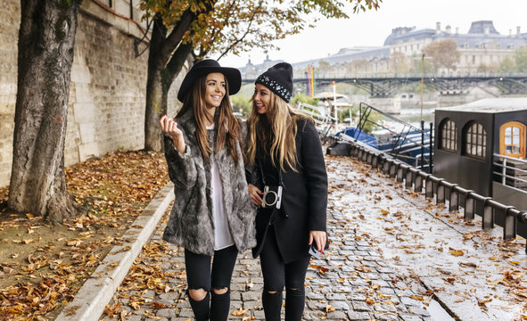 Paris, France, two women strolling near River Seine