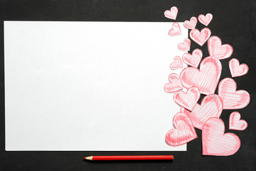 Greeting card with a red drawing hearts and space for text on dark background