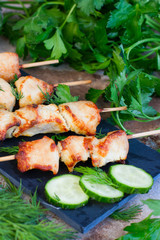 Skewers of chicken on wooden skewers