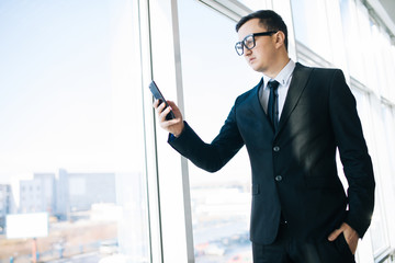 Fototapeta premium young businessman on the phone