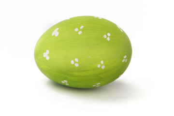 Green easter egg isolated on a white.