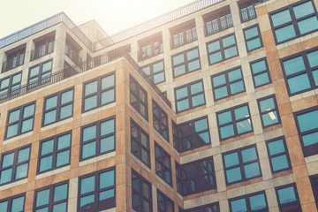 modern architectured office buildings with sunlight on the top