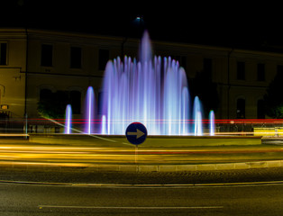 colored fountain with car light stripes
