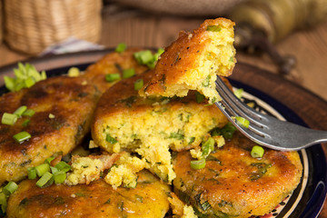 Piece of homemade fried pea chikpea fritter on fork
