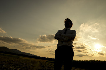 Fototapeta premium Silhouette of a man at sunset