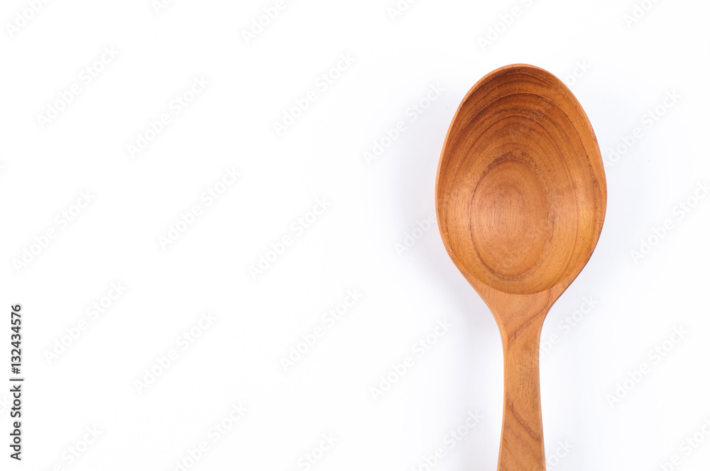 Wall mural Wooden spoon on White background.