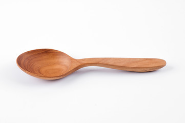 Wooden spoon on White background.