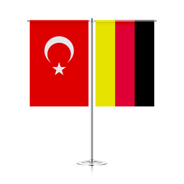 table stand with flags of turkey and germany. symbolizing the cooperation between the two countries. vector table flags
