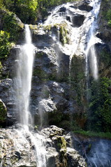 Obraz premium Waterfall in deep forest on the mountain.
