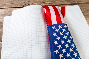 Fototapeta premium open book on American flag