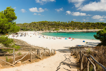 Fototapeta na wymiar Cala S'Amarador. Beach is one of two beautiful beaches in Mondrago Natural Park on the south eastern coast of Mallorca. Mallorca island, Spain.