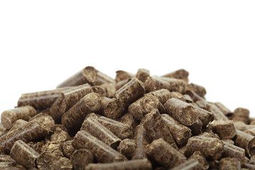 stack of wooden pellets for bio energy, white background, isolated