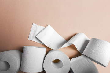 Toilet paper on pink background