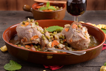 earthenware pan with melted turkey and aromas