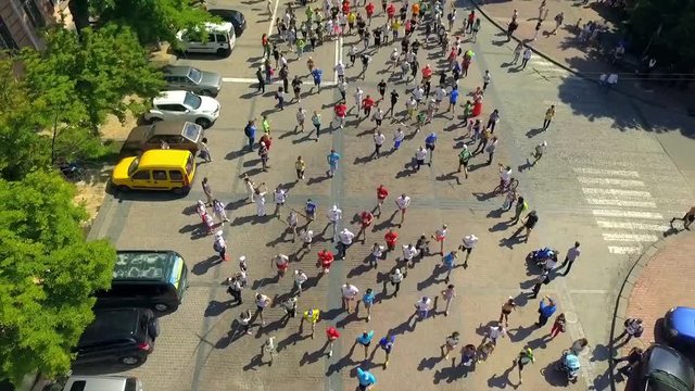 Aerial footage. Marathon on streets.