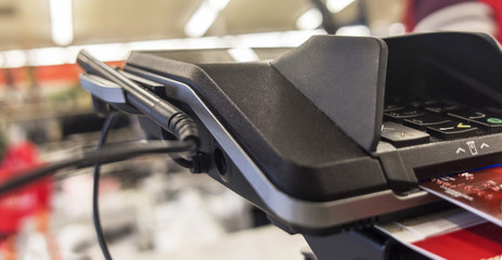 Credit card purchase. Credit card swiping on card reader device.